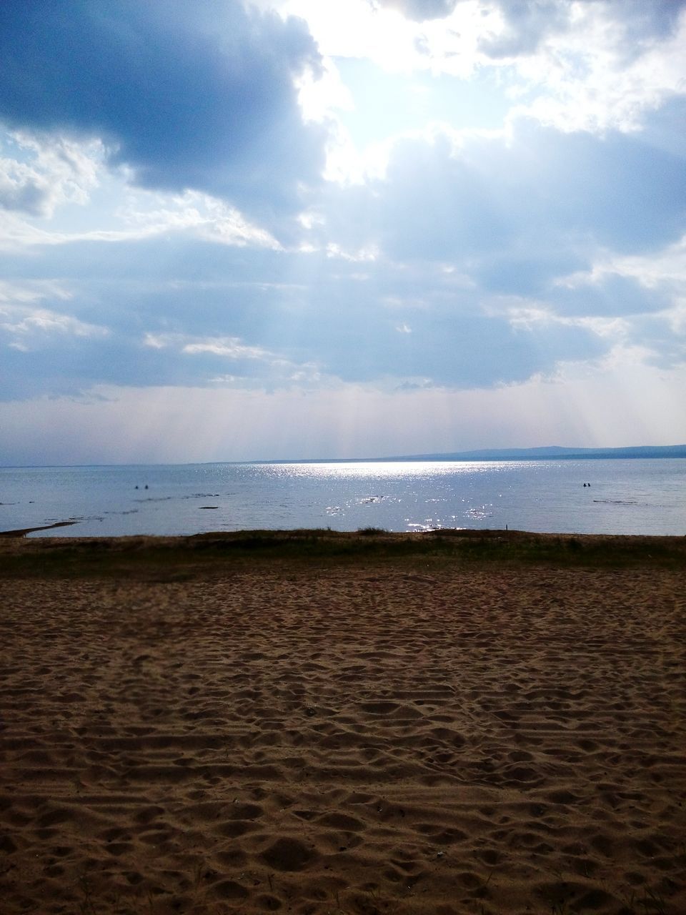 sea, horizon over water, beach, water, sky, tranquil scene, sand, tranquility, scenics, shore, beauty in nature, nature, cloud - sky, cloud, idyllic, seascape, cloudy, calm, coastline, remote