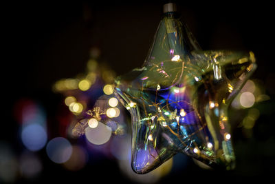 Close-up of illuminated christmas tree at night
