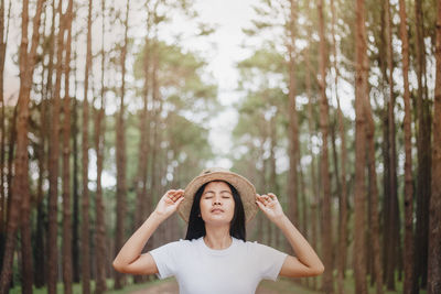 Portrait of a young woman in the forest