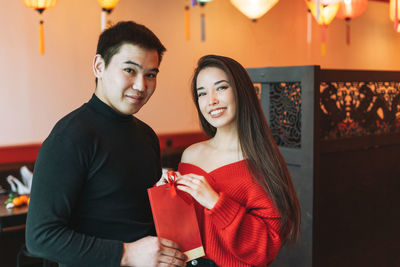 Portrait of a smiling young couple