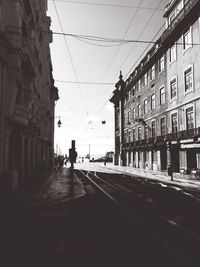 People walking on road in city