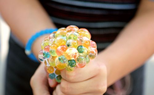 Close-up of hand holding ice cream