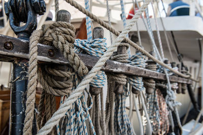 Close-up of rope tied to railing