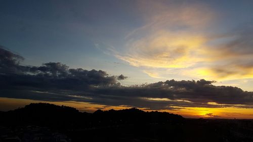 Scenic view of silhouette trees against sky during sunset