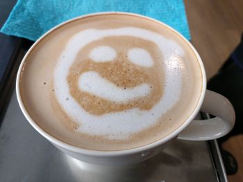 High angle view of cappuccino on table