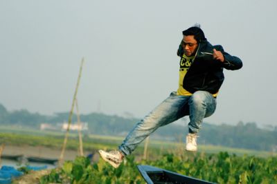 Action jump over a boat