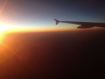 Airplane flying over landscape