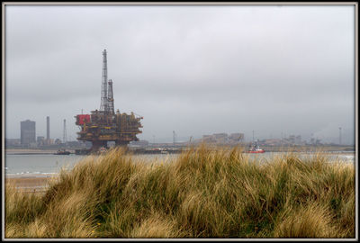View of sea against cloudy sky