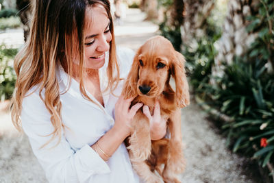 Woman with dog at park