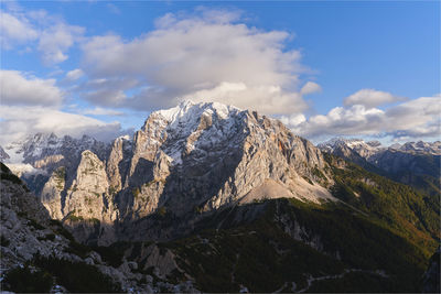 Scenic view of snowcapped mountains against sky  in triglav national park slovenia