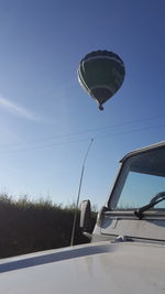 Low angle view of airshow against clear blue sky