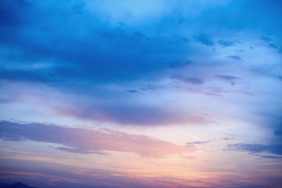 Low angle view of dramatic sky during sunset