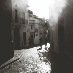 Narrow alley along buildings