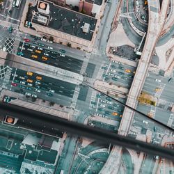 High angle view of road amidst buildings in city
