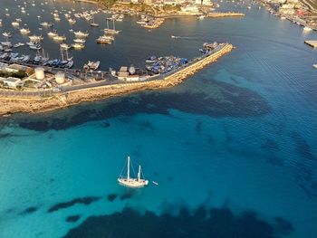 High angle view of sailboat sailing in sea