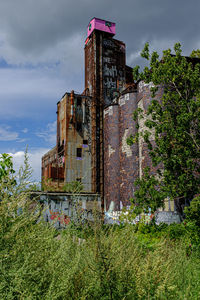 Low angle view of old building against sky