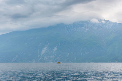 Lake by majestic mountain