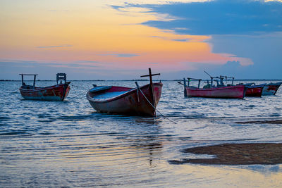 Sunset view with cloudy sky at gadani beach with dhow boat