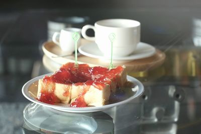 Close-up of coffee cup on table