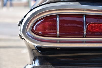 Close-up of vintage car on street