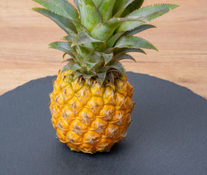 Close-up of pineapple on table