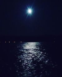 Reflection of clouds in water at night