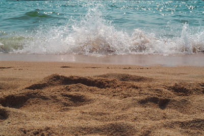 Waves splashing on shore