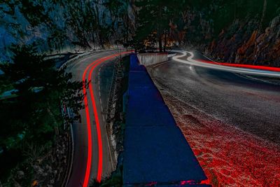 High angle view of light trails on road