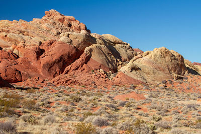 Scenic view of rocky mountains against clear sky