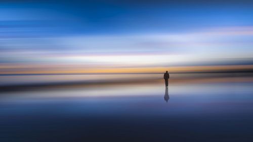 Scenic view of sea against sky during sunset