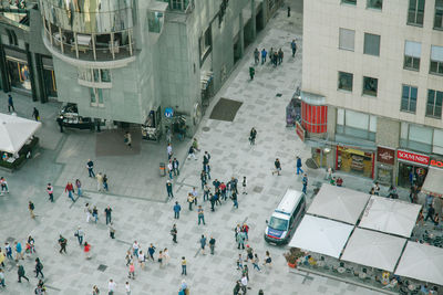 High angle view of people on city street