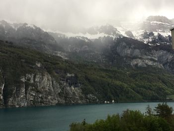 Scenic view of sea and mountains