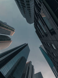 Low angle view of modern buildings against sky