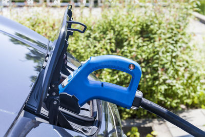 Charging of an electric car, close-up