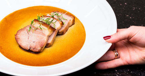 High angle view of person preparing food in bowl