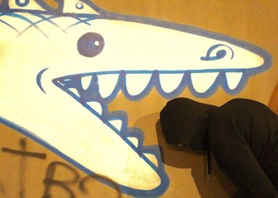 Low section of man standing on text