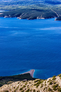 High angle view of beach against blue sky