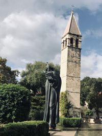 View of statue against cloudy sky