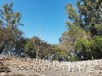 View of cemetery against clear blue sky