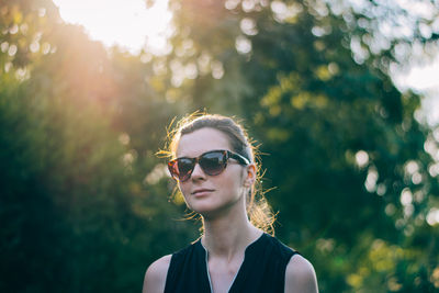 Portrait of young woman wearing sunglasses