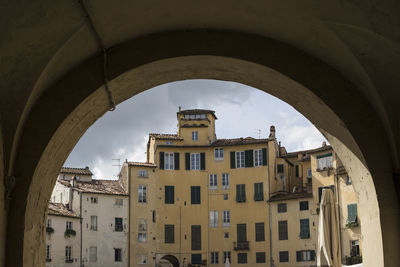 Buildings in city against sky