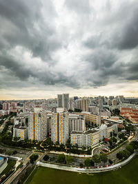 High angle view of buildings against sky in city