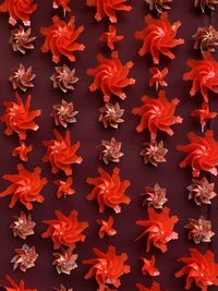 Full frame shot of red origami flowers 