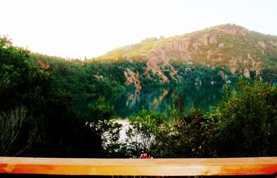 Scenic view of lake against clear sky