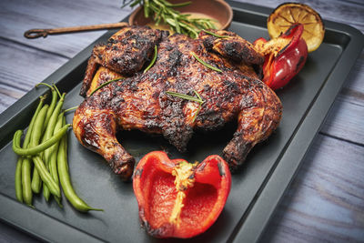 High angle view of meat in plate on table