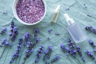 Spa products and lavender flowers. aromatherapy lavender bath salt and massage oil