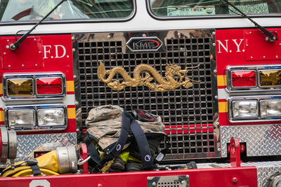 View of red truck in bus