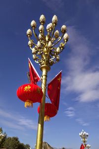 Low angle view of statue against sky