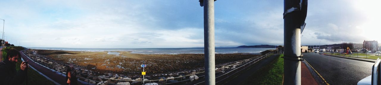 sea, horizon over water, sky, water, beach, panoramic, shore, the way forward, cloud - sky, scenics, road, nature, tranquil scene, tranquility, transportation, beauty in nature, railing, sand, cloud, coastline