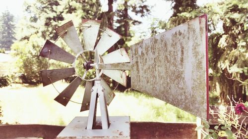 Close-up of windmill on tree